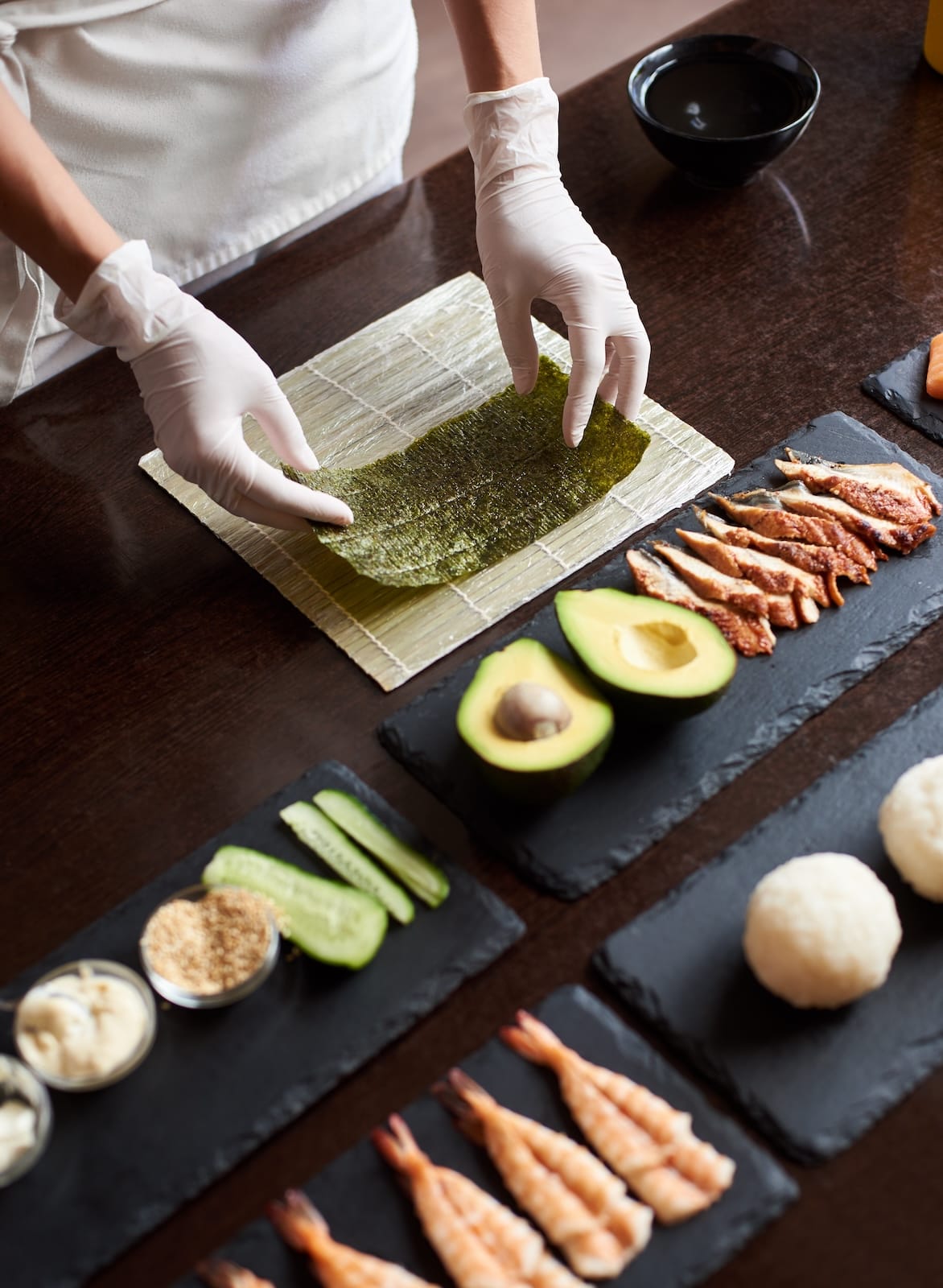 process-of-preparing-rolling-sushi-2023-11-27-05-04-40-utc